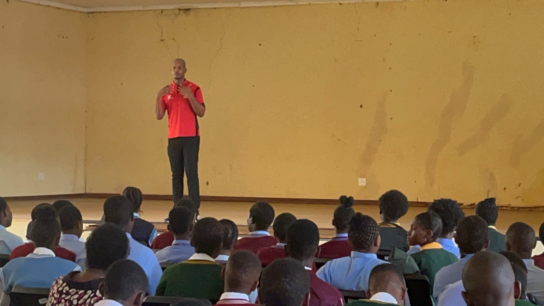 Youth Development Program - Speaker presenting to engaged students